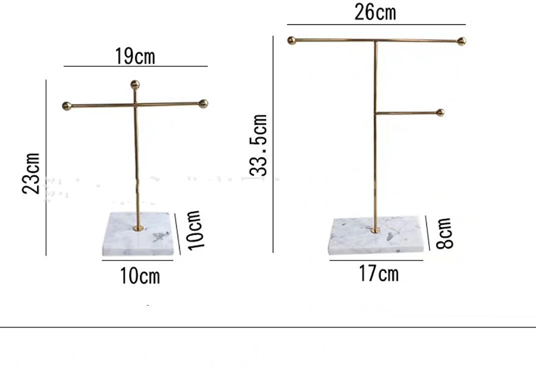 luxury vanity setup jewelry stand gold and marble aesthetic