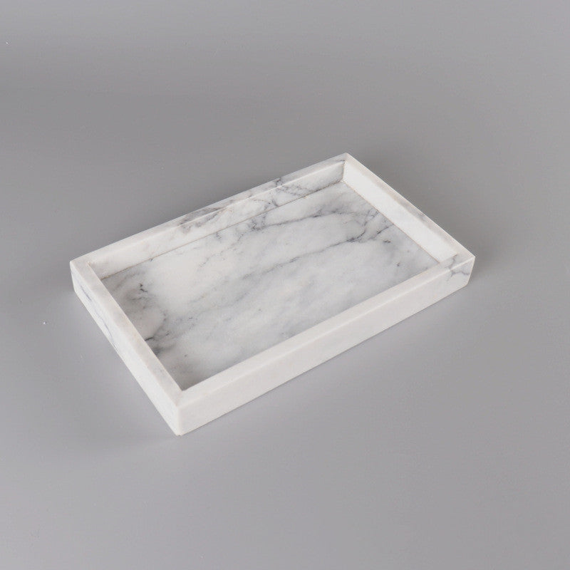 stone inspired tray used for organizing candles and decor items