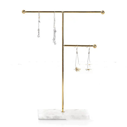 gold jewelry organizer minimalist bedroom decor