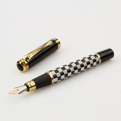 elegant writing pen placed on neutral papeterie setup