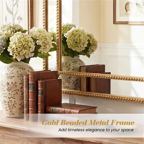 arched statement mirror styled above fireplace mantel