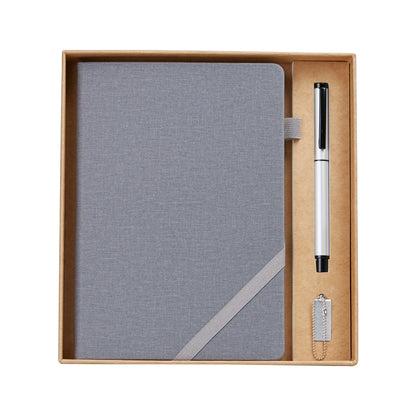 solid color notebook set arranged on neutral desk environment