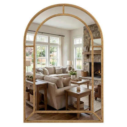 Maison Fontaine arched mirror gold frame in modern entryway