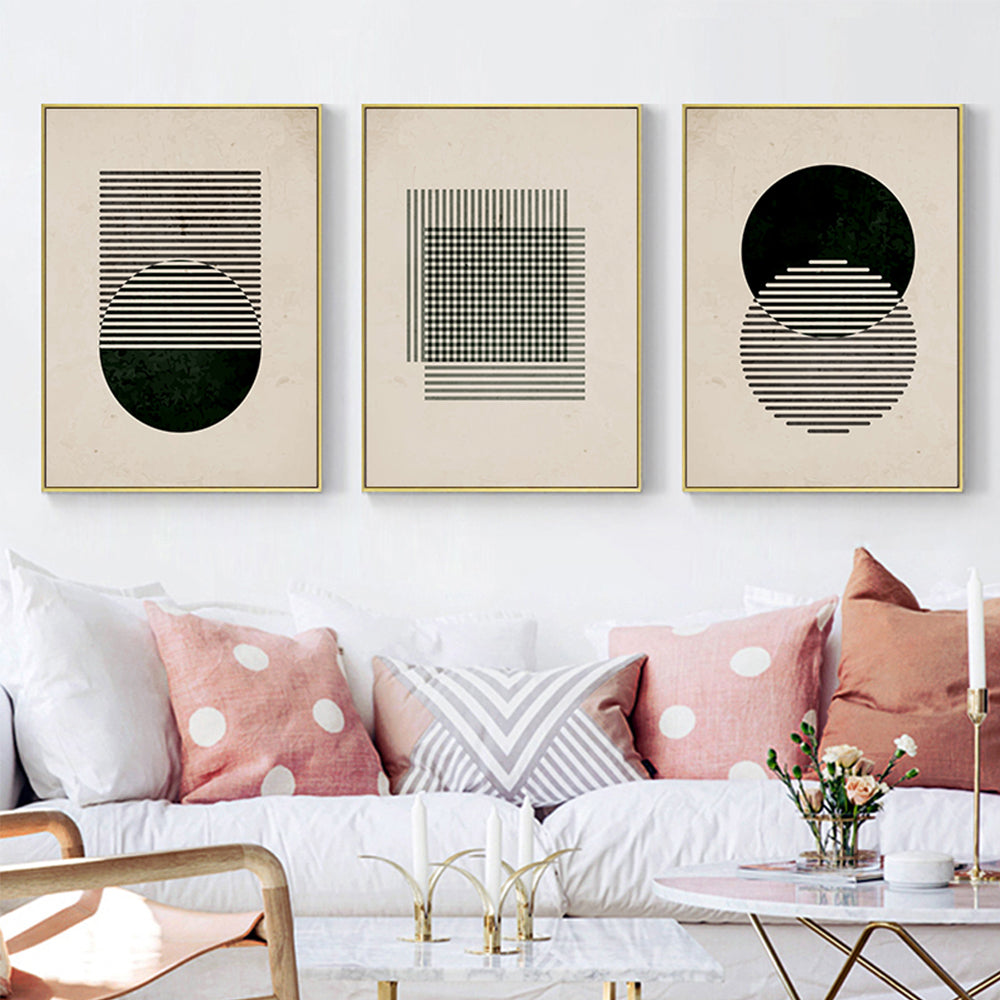 abstract black and white wall art displayed in neutral interior