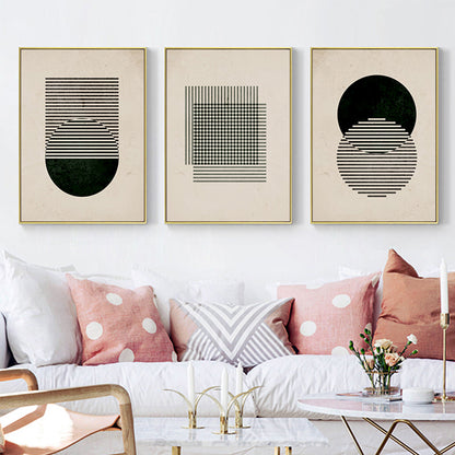 abstract black and white wall art displayed in neutral interior