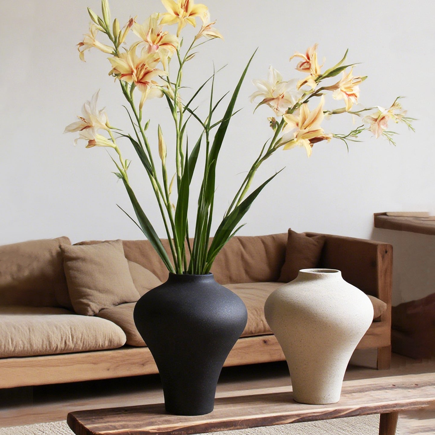 Black and white ceramic hydroponic decor on modern shelf