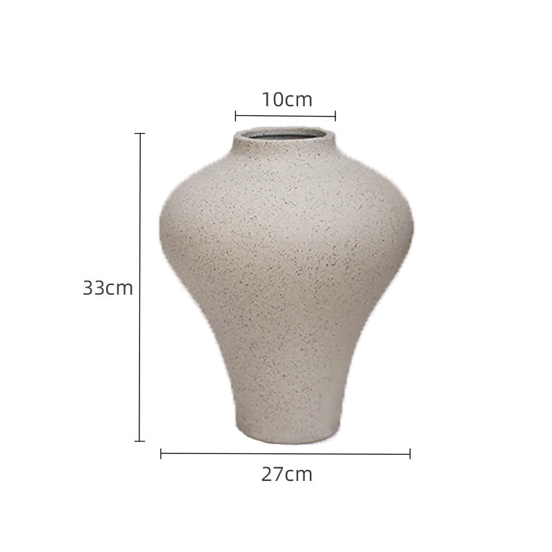 Ceramic decorative object styled in minimalist bedroom