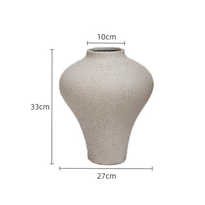 Ceramic decorative object styled in minimalist bedroom